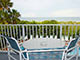 Balcony overlooking ocean and pool